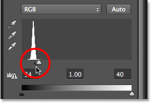 Dragging the black point slider towards the right. Image © 2013 <a href='https://www.86ps.com/'><font color=''>Photoshop</font></a> Essentials.com