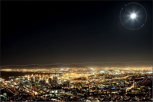 The area around the moon has been added to the initial selection. Image © 2013 <a href='https://www.86ps.com/'><font color=''>Photoshop</font></a> Essentials.com